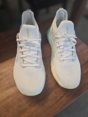 Reebok White Sneakers with Pale Aqua and Soft Yellow Accents